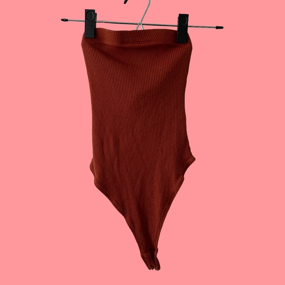 Orange tube top bodysuit